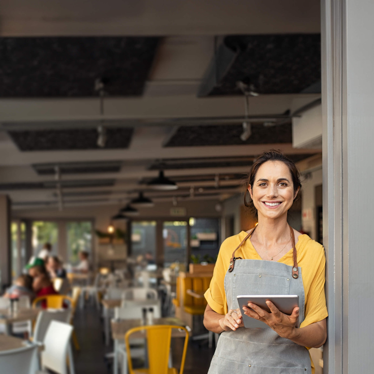 Female business owner using reliable ultrafast full fibre broadband.